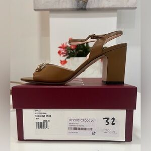 GUCCI
Lady Horsebit 75 leather sandals